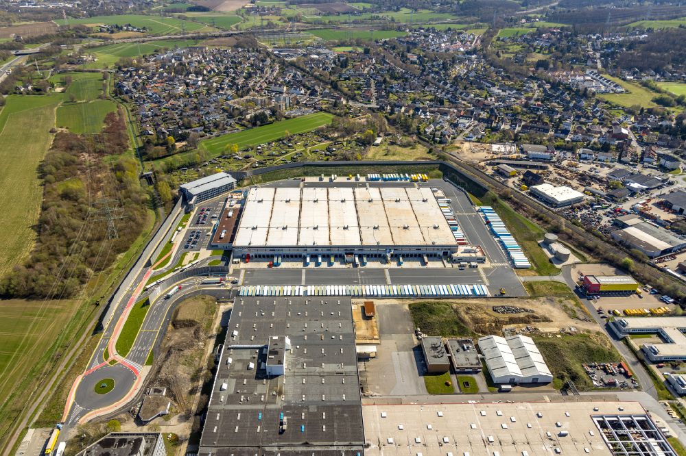 Aerial photograph Witten - Building complex and grounds of the logistics center with a new Amazon building on Menglinghauser Strasse - Siemensstrasse in the district Ruedinghausen in Witten at Ruhrgebiet in the state North Rhine-Westphalia, Germany