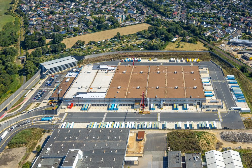 Aerial photograph Witten - building complex and grounds of the logistics center with a new Amazon building on Menglinghauser Strasse - Siemensstrasse in the district Ruedinghausen in Witten at Ruhrgebiet in the state North Rhine-Westphalia, Germany