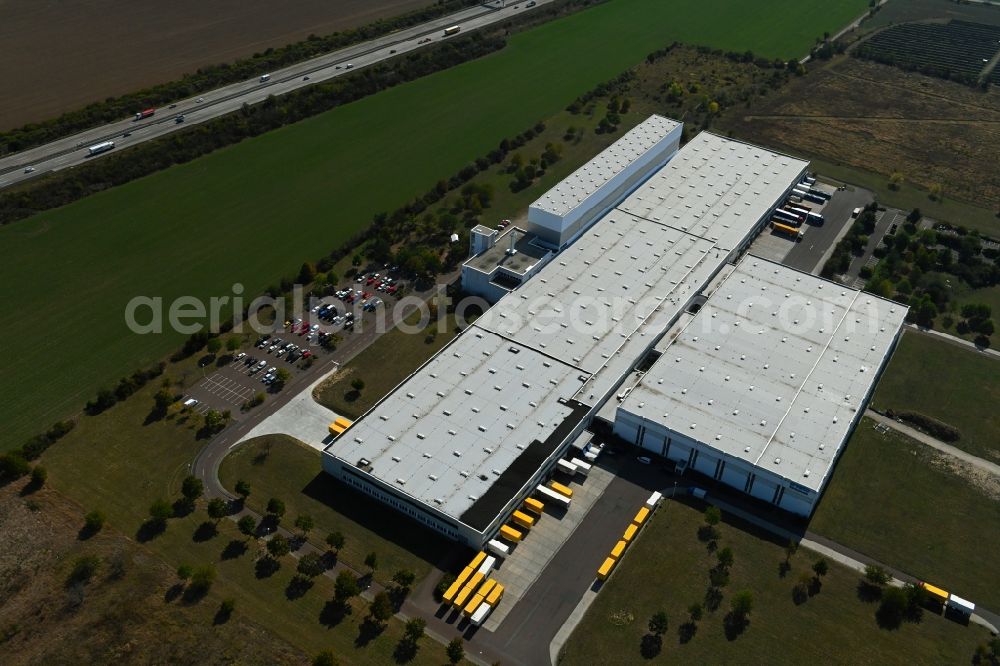 Zörbig from the bird's eye view: Building complex and grounds of the logistics center of Arvato Distribution GmbH & Arvato Supply Chain Solutions SE on Loesnitz Mark in the district Grosszoeberitz in Zoerbig in the state Saxony-Anhalt, Germany
