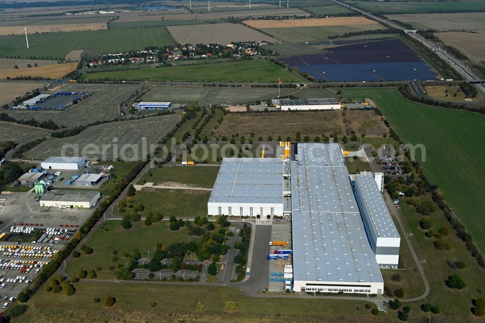 Zörbig from the bird's eye view: Building complex and grounds of the logistics center of Arvato Distribution GmbH & Arvato Supply Chain Solutions SE on Loesnitz Mark in the district Grosszoeberitz in Zoerbig in the state Saxony-Anhalt, Germany