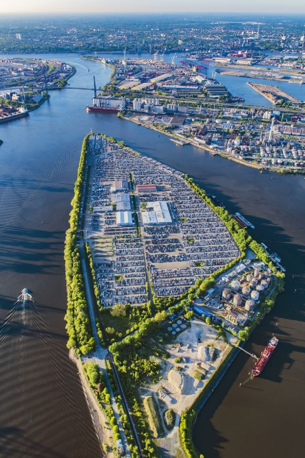 Aerial image Hamburg - Premises of the distribution center of BLG Autoterminal Hamburg Gmbh&Co.KG with parking lots on the Kattwyk peninsula in Hamburg in Germany. The peninsula is located between Rethe and South Elbe rivers and in front of the borough of Altenwerder