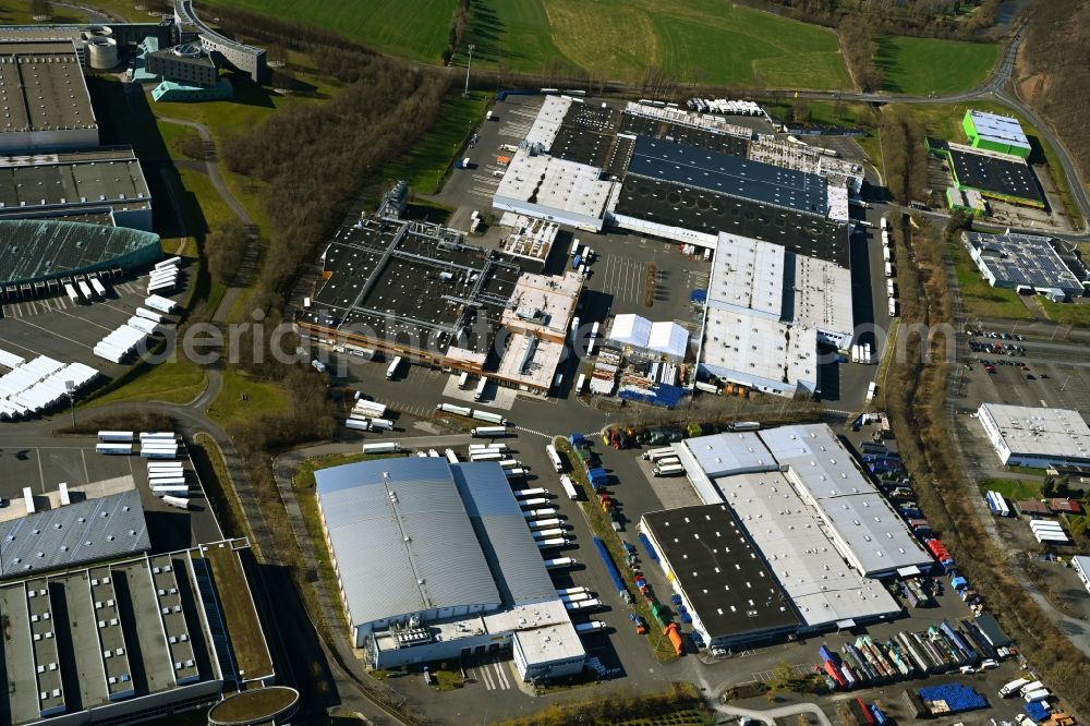 Aerial image Melsungen - Building complex and grounds of the logistics center of EDEKA Handelsgesellschaft Hessenring GmbH Unter dem Schoeneberg in Melsungen in the state Hesse, Germany
