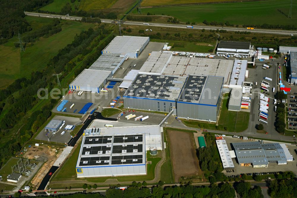 Lüttow-Valluhn from above - Building complex and grounds of the logistics center of EDEKA Nord Service- and Logistikgesellschaft mbH Am Heisterbusch in the district Valluhn in Luettow-Valluhn in the state Mecklenburg - Western Pomerania, Germany