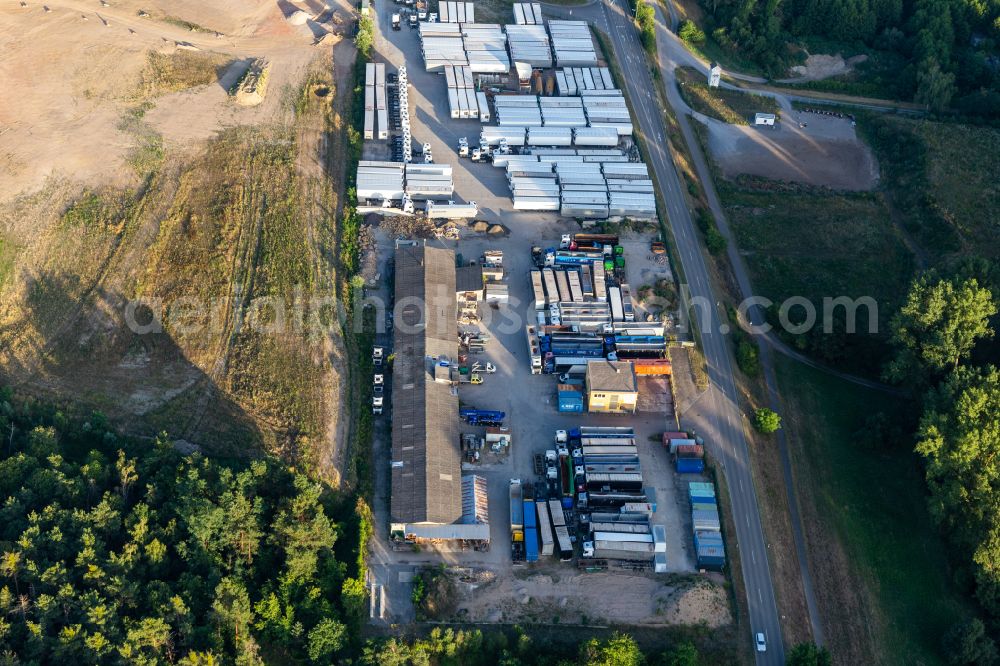 Graben-Neudorf from above - Building complex and grounds of the logistics center HeKa Herzog GmbH on street Huttenheimer Landstrasse in Graben-Neudorf in the state Baden-Wuerttemberg, Germany