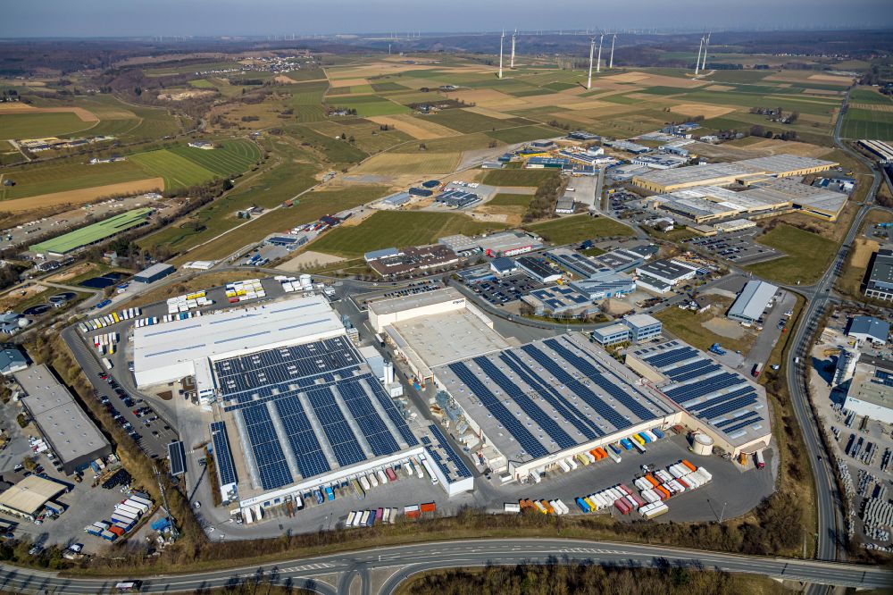 Brilon from above - Building complex and grounds of the logistics center of Impuls Kuechen GmbH and of puris Bad GmbH & Co. KG Hinterm Gallberg in Brilon in the state North Rhine-Westphalia, Germany