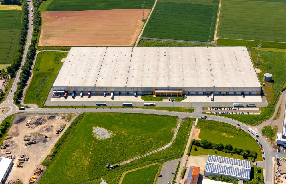 Korbach from the bird's eye view: Building complex and grounds of the logistics center on Raiffeisenstrasse in Korbach in the state Hesse, Germany