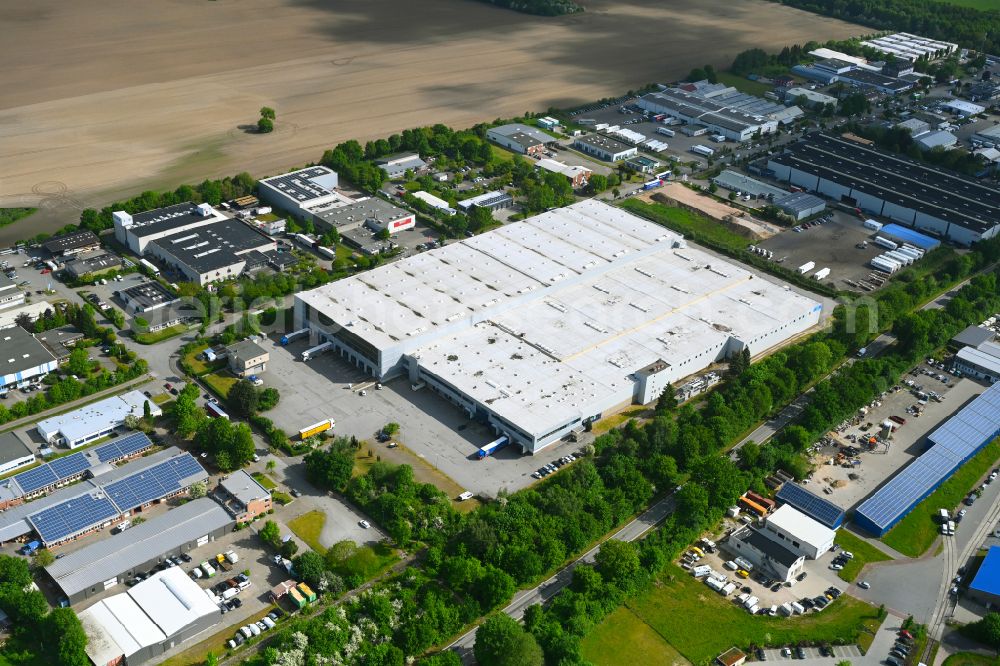 Blumendorf from the bird's eye view: Building complex and grounds of the logistics center Logistikzentrum Hako GmbH on street Roegen in Blumendorf in the state Schleswig-Holstein, Germany