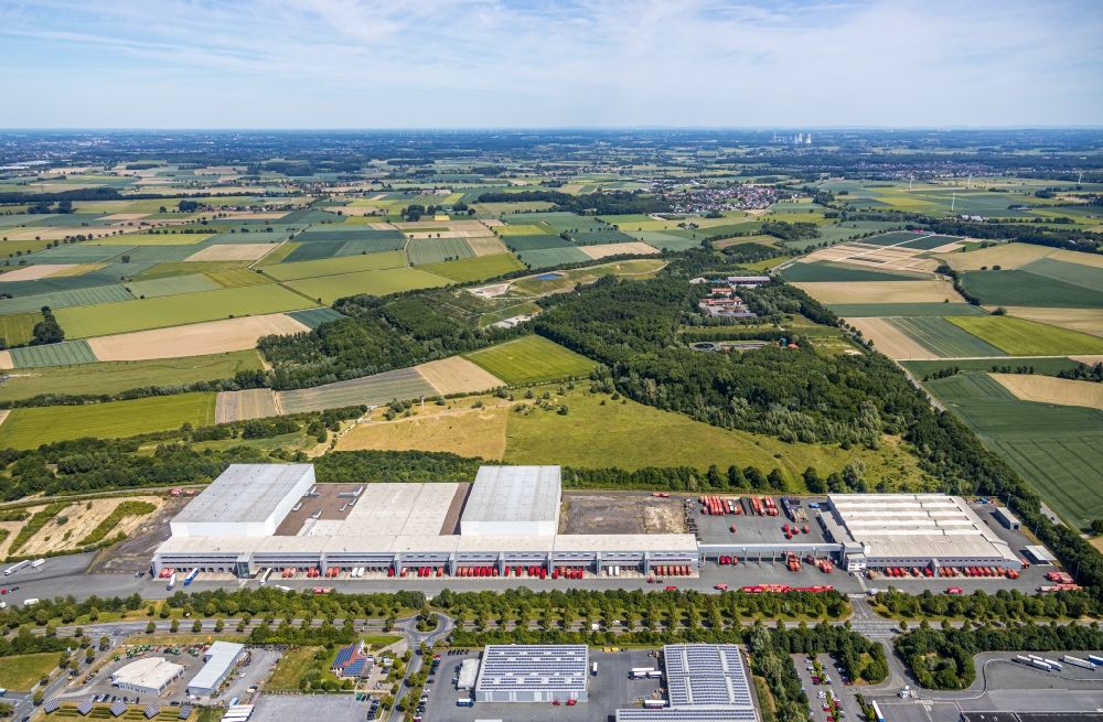 Werl from the bird's eye view: Building complex and grounds of the logistics center A T U on Hansering in the district Soennern in Werl in the state North Rhine-Westphalia, Germany