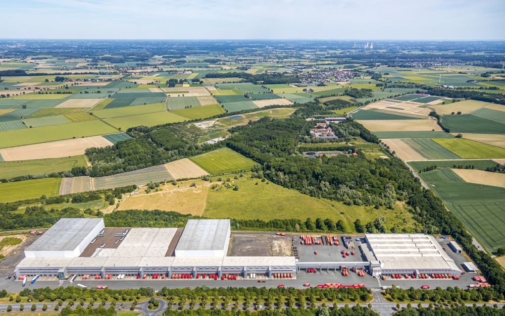 Aerial image Werl - Building complex and grounds of the logistics center A T U on Hansering in the district Soennern in Werl in the state North Rhine-Westphalia, Germany