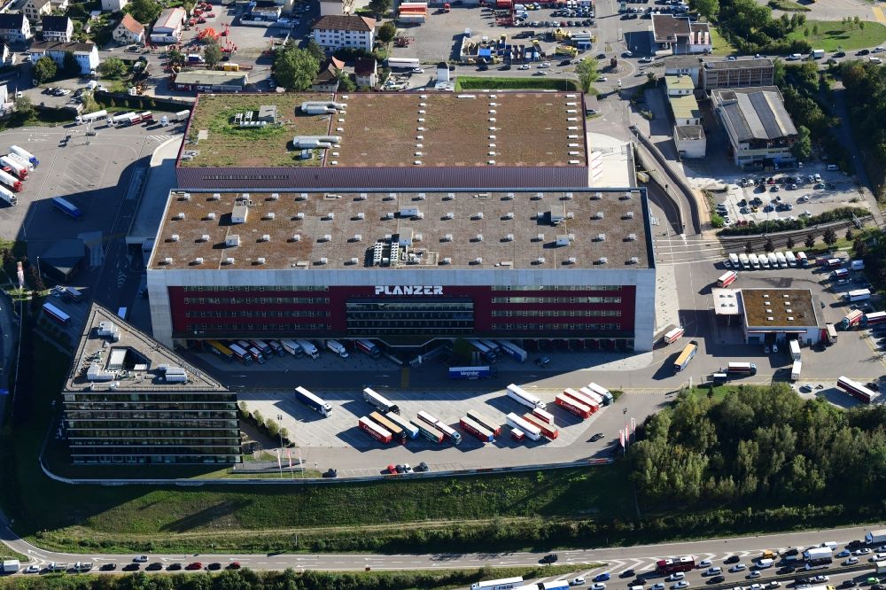Pratteln from the bird's eye view: Building complex and grounds of the logistics center Planzer Transport AG in Pratteln in the canton Basel-Landschaft, Switzerland