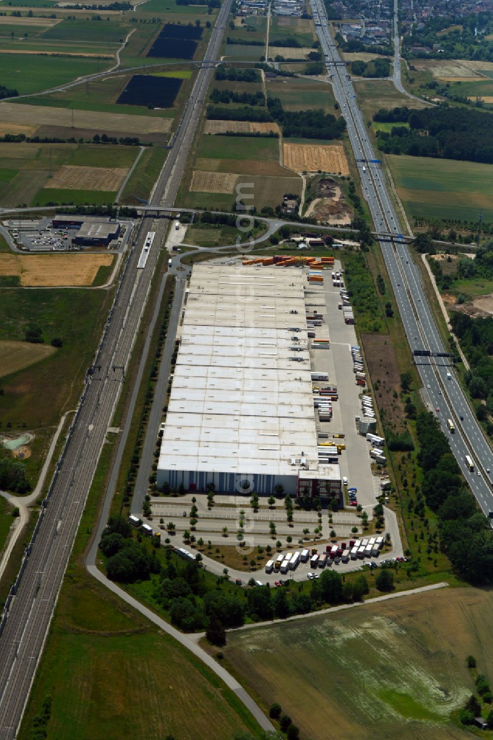 Forchheim from the bird's eye view: Building complex and grounds of the logistics center of Simon Hegele Gesellschaft fuer Logistik und Service mbH in Forchheim in the state Bavaria, Germany