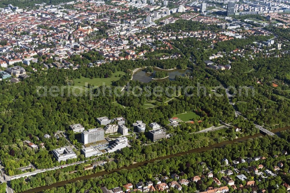 München from above - Complex of the hotel building Hilton Munich Park and office buildings on Tucherpark and the riverbank of the Isar in Munich in the state of Bavaria. The Tucherpark is located at the Eisbach between the English garden and the Isar. Initiator was the Bayerische Vereinsbank