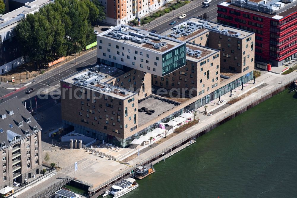 Berlin from the bird's eye view: Complex of the hotel building Hotel nhow on Stralauer Allee in the district Friedrichshain in Berlin, Germany