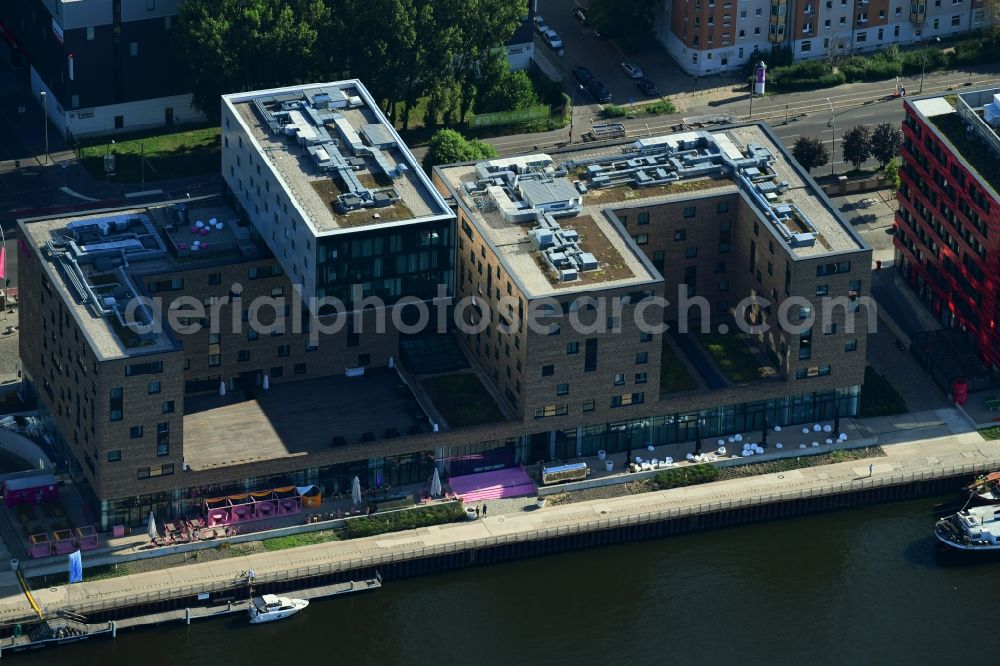 Aerial image Berlin - Complex of the hotel building Hotel nhow on Stralauer Allee in the district Friedrichshain in Berlin, Germany