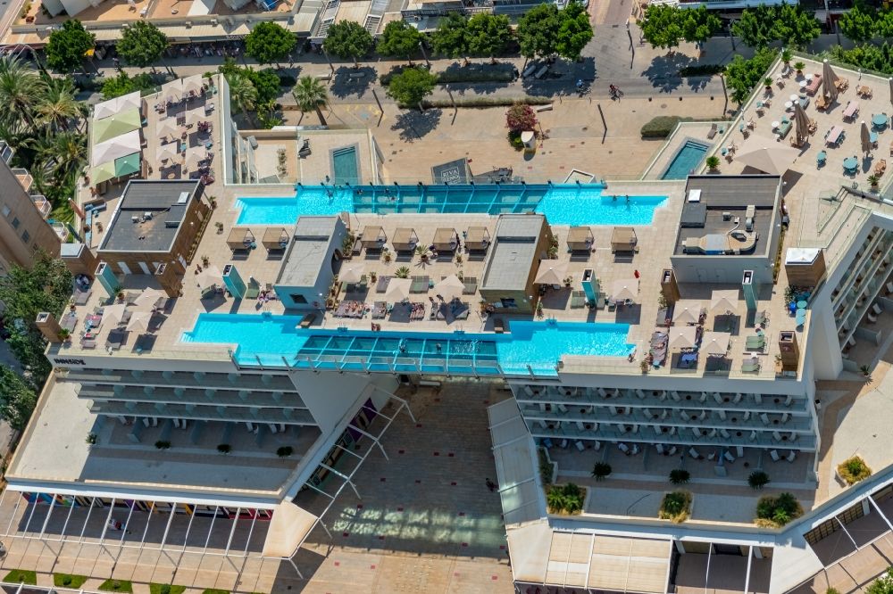 Aerial photograph Calvia - Complex of the hotel building of INNSiDE Calvia Beach with swimming pool on the roof on Avinguda de l'Olivera in Calvia in Balearic island of Mallorca, Spain