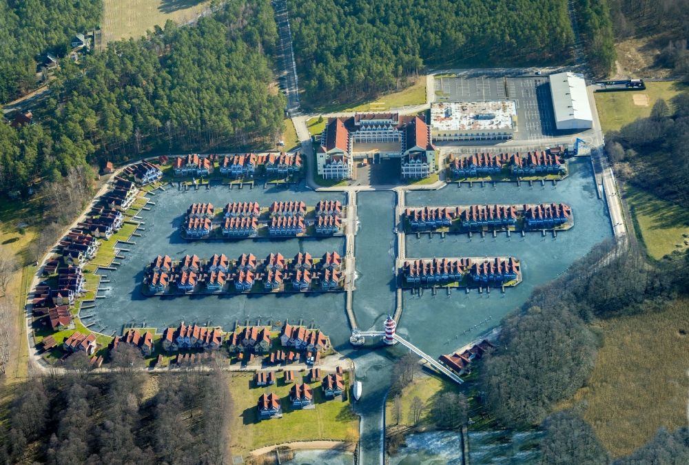 Aerial photograph Rheinsberg - Building complex of the hotel complex Maritim Hafenhotel Rheinsberg in Rheinsberg on the bank of the Rheinsberg lake in the state of Brandenburg, Germany