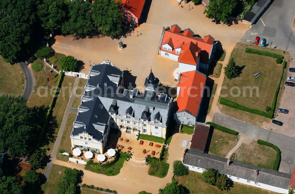 Liebenberg from the bird's eye view: Complex of the hotel building Schloss & Gut Liebenberg in Liebenberg in the state Brandenburg, Germany