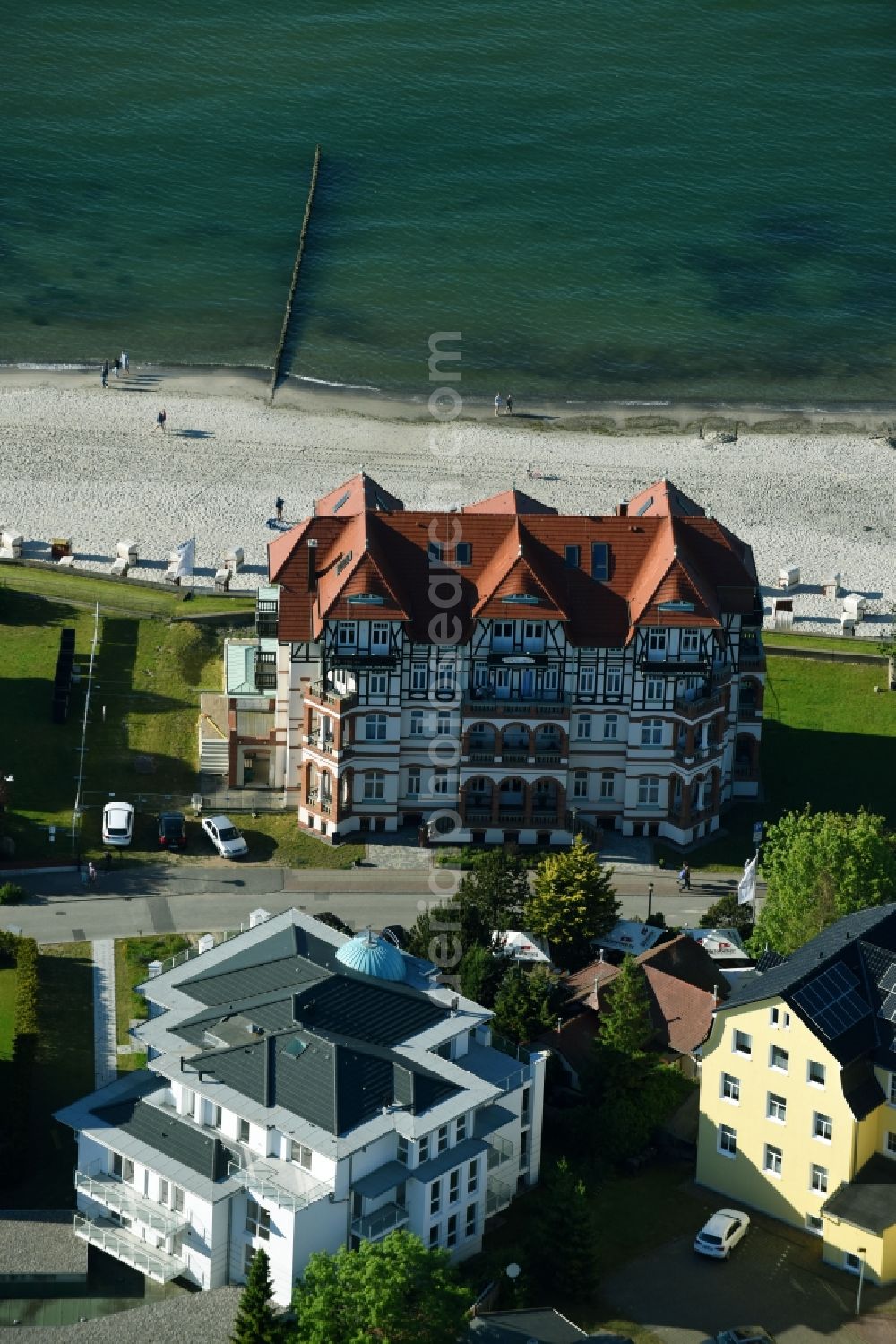 Kühlungsborn from above - Complex of buildings of the hotel arrangement Castle by the sea on the beach of the Baltic Sea in cooling spring in the federal state Mecklenburg-West Pomerania, Germany