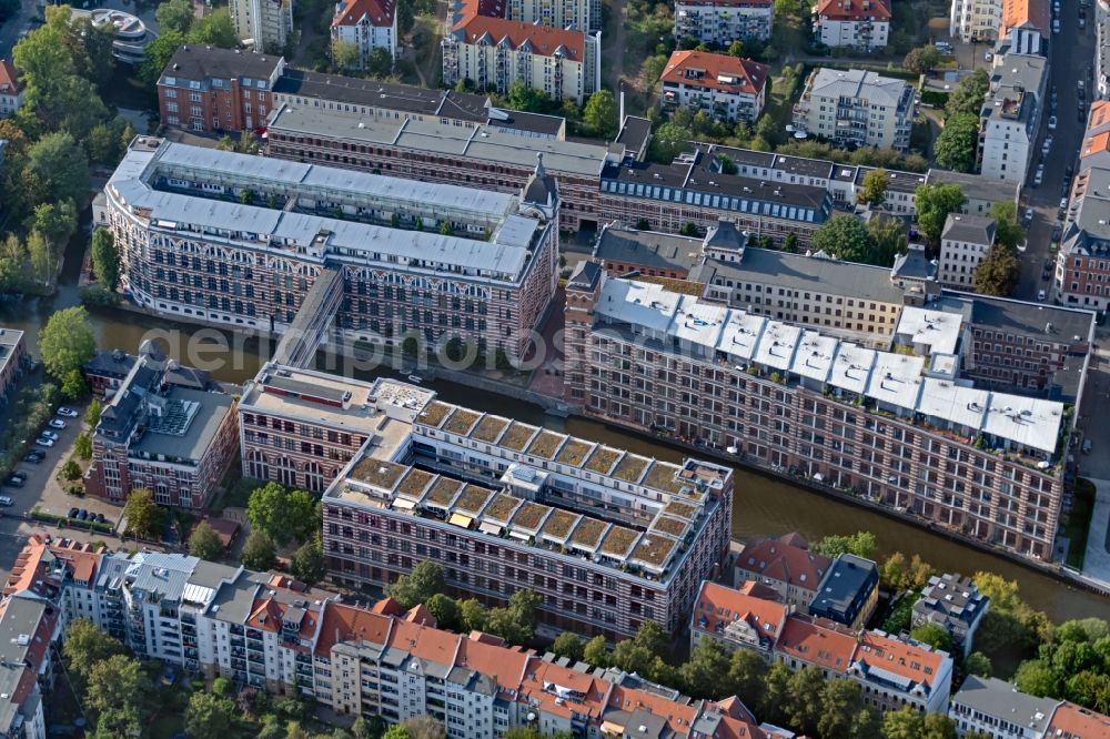 Aerial photograph Leipzig - Complex of the hotel building TRINOM Business Apartments, Elster Lofts in the office and commercial building district along the course of the Weisse Elster river on Nonnenstrasse in the district Plagwitz in Leipzig in the state Saxony