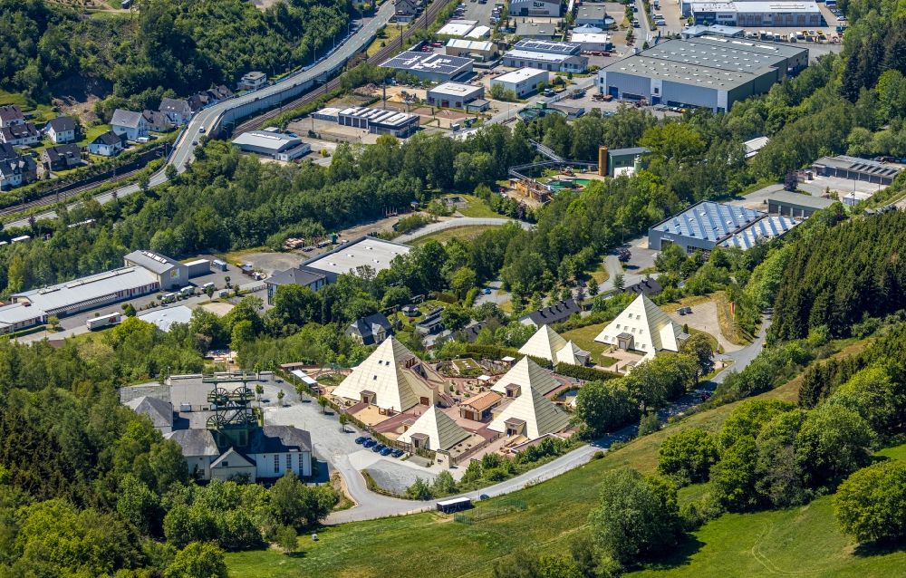 Aerial image Lennestadt - Building complex of the Institute of Wolfgang Schmidt e.K. and of Rayonex Biomedical GmbH with the Sauerland-Pyramids and the Galileo-Park in the district Meggen in Lennestadt in the state North Rhine-Westphalia, Germany. The plans for the Sauerland pyramids were designed by the architect Harry Lechler