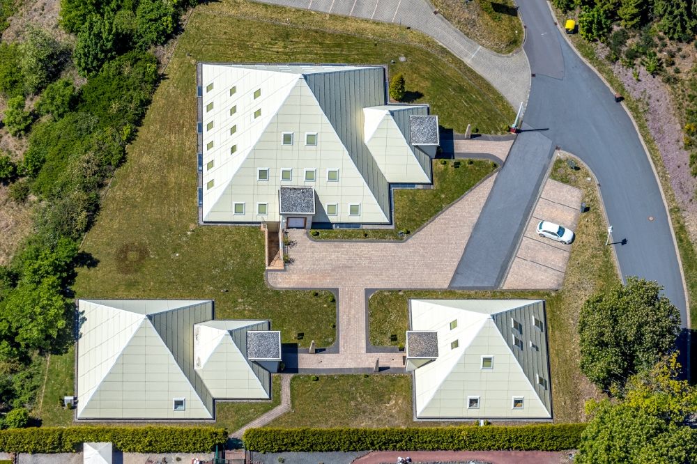 Lennestadt from above - Building complex of the Institute of Wolfgang Schmidt e.K. and of Rayonex Biomedical GmbH with the Sauerland-Pyramids and the Galileo-Park in the district Meggen in Lennestadt in the state North Rhine-Westphalia, Germany. The plans for the Sauerland pyramids were designed by the architect Harry Lechler