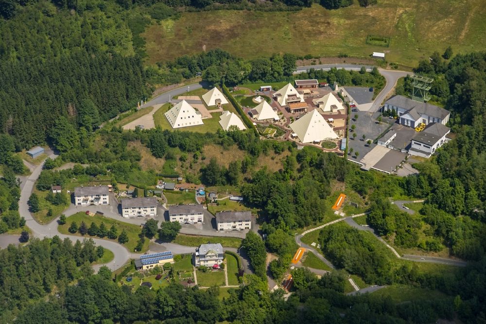 Aerial photograph Lennestadt - Building complex of the Institute of Wolfgang Schmidt e.K. and of Rayonex Biomedical GmbH with the Sauerland-Pyramids and the Galileo-Park in the district Meggen in Lennestadt in the state North Rhine-Westphalia, Germany. The plans for the Sauerland pyramids were designed by the architect Harry Lechler