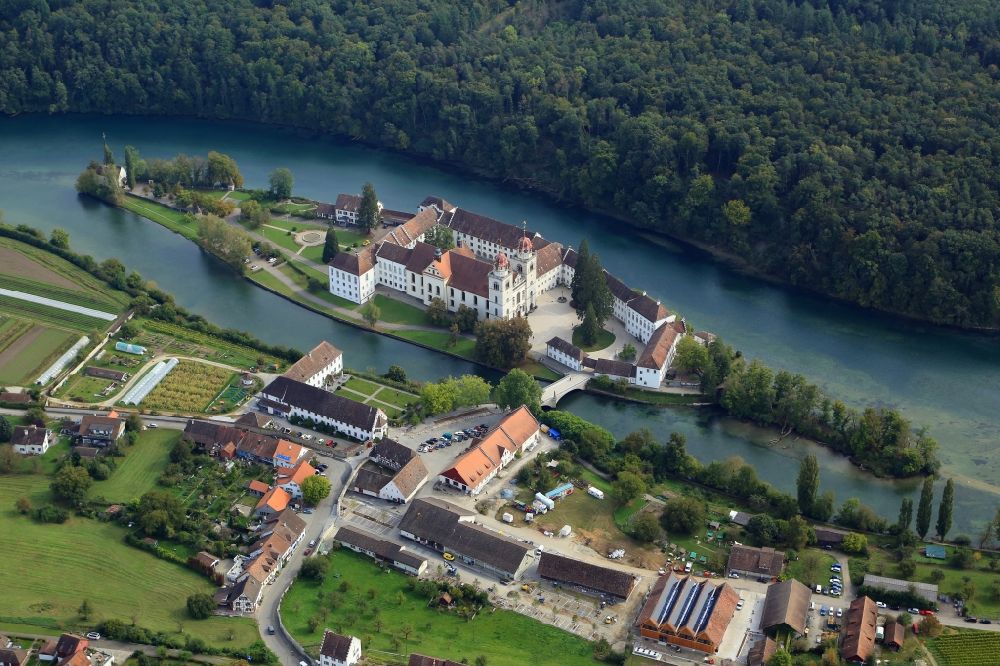 Aerial photograph Rheinau - Complex of buildings of the monastery Rheinau at the river Rhine in Rheinau in the canton Zurich, Switzerland
