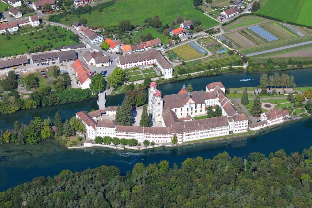 Aerial image Rheinau - Complex of buildings of the monastery Rheinau at the river Rhine in Rheinau in the canton Zurich, Switzerland