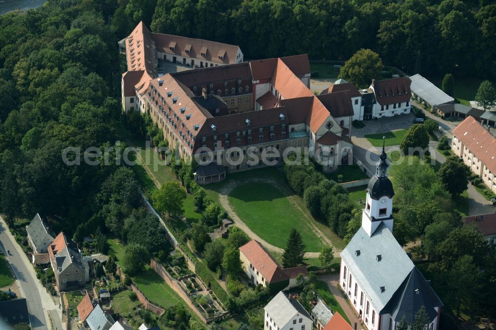 Aerial image Wechselburg - Complex of buildings of the monastery of Wechselburg in the state of Saxony. The benedictine compound includes a late-romanic Basilika. The church is parochial church and a place of pilgrimage