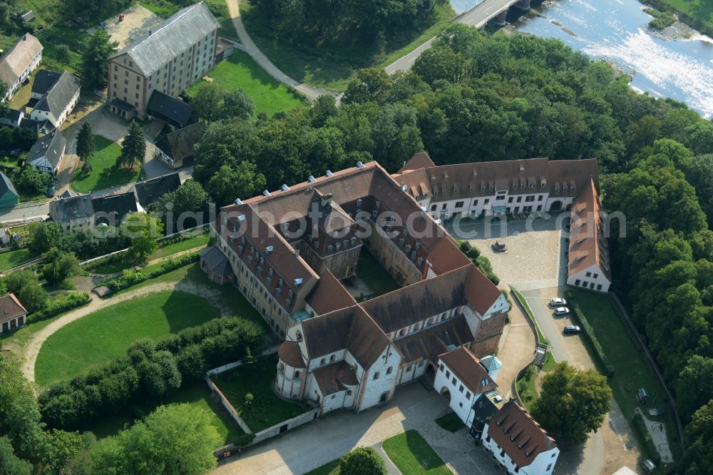 Aerial photograph Wechselburg - Complex of buildings of the monastery of Wechselburg in the state of Saxony. The benedictine compound includes a late-romanic Basilika. The church is parochial church and a place of pilgrimage