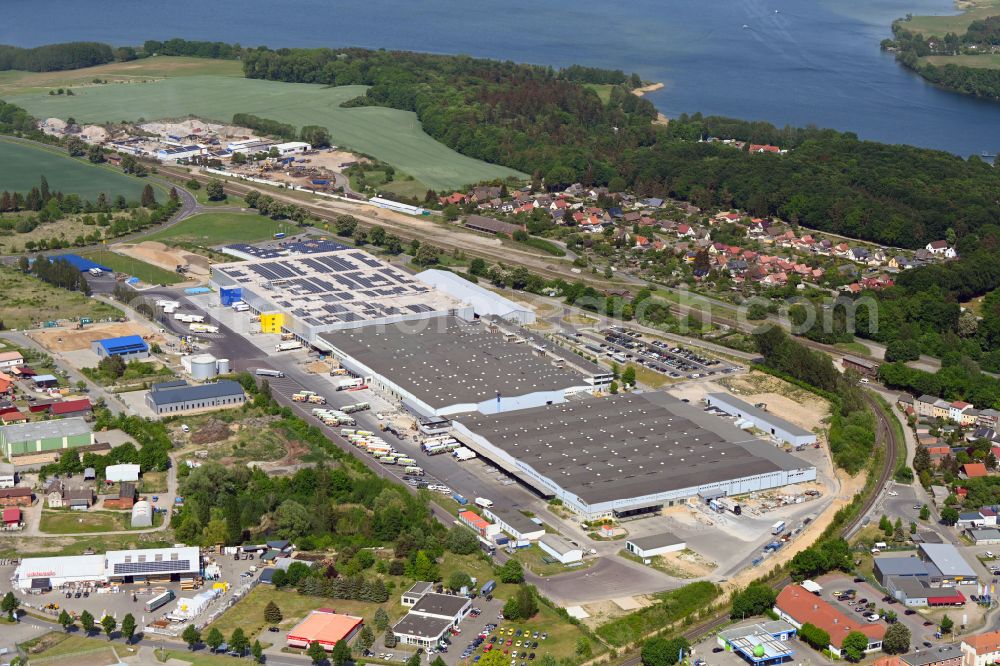 Malchow from the bird's eye view: Building complex and distribution center on the site on street Bahnhofstrasse in Malchow in the state Mecklenburg - Western Pomerania, Germany