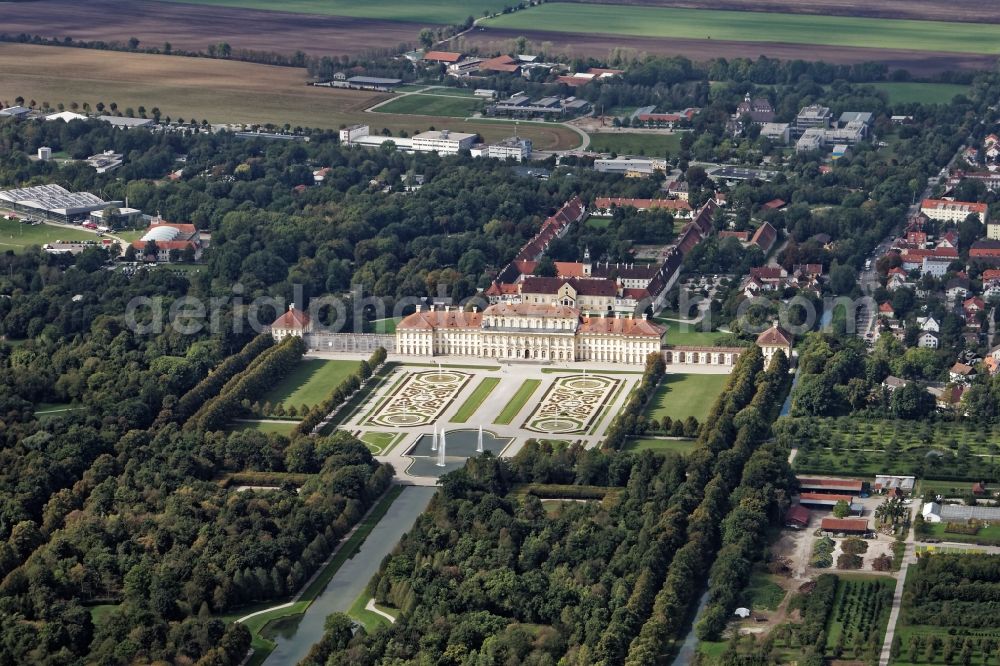 Aerial image Oberschleißheim - New and old castle in the Schleissheim palace in the park of Schloss Oberschleissheim, courtyard garden with fountain and channel in Oberschleissheim in the state Bavaria The monumental new castle was built by Elector Max Emanuel, designed by Enrico Zuccalli from 1701. The Old Castle goes back to a house built under Duke Wilhelm mansion that was the center of the extensive Schwaighof and was called Wilhelmsbau