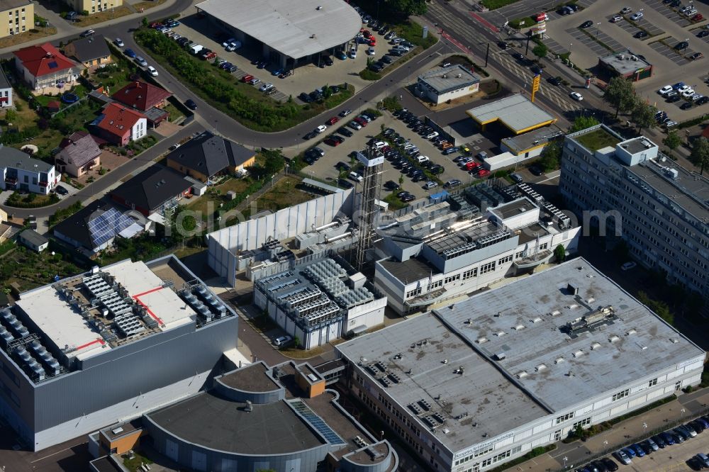 Aerial image Magdeburg - Building complex of T-Systems International GmbH on Luebecker Strasse in the Neustadt part of Magdeburg in the state Saxony-Anhalt. The company is an internationally operating information and communication technology (ICT) company. It belongs to Deutsche Telekom AG. A Jet gas station is located behind it