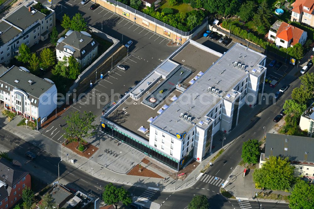 Aerial photograph Berlin - Complex of the LIDL - shopping center on street Giesestrasse corner Hoenoer Strasse in the district Mahlsdorf in Berlin, Germany