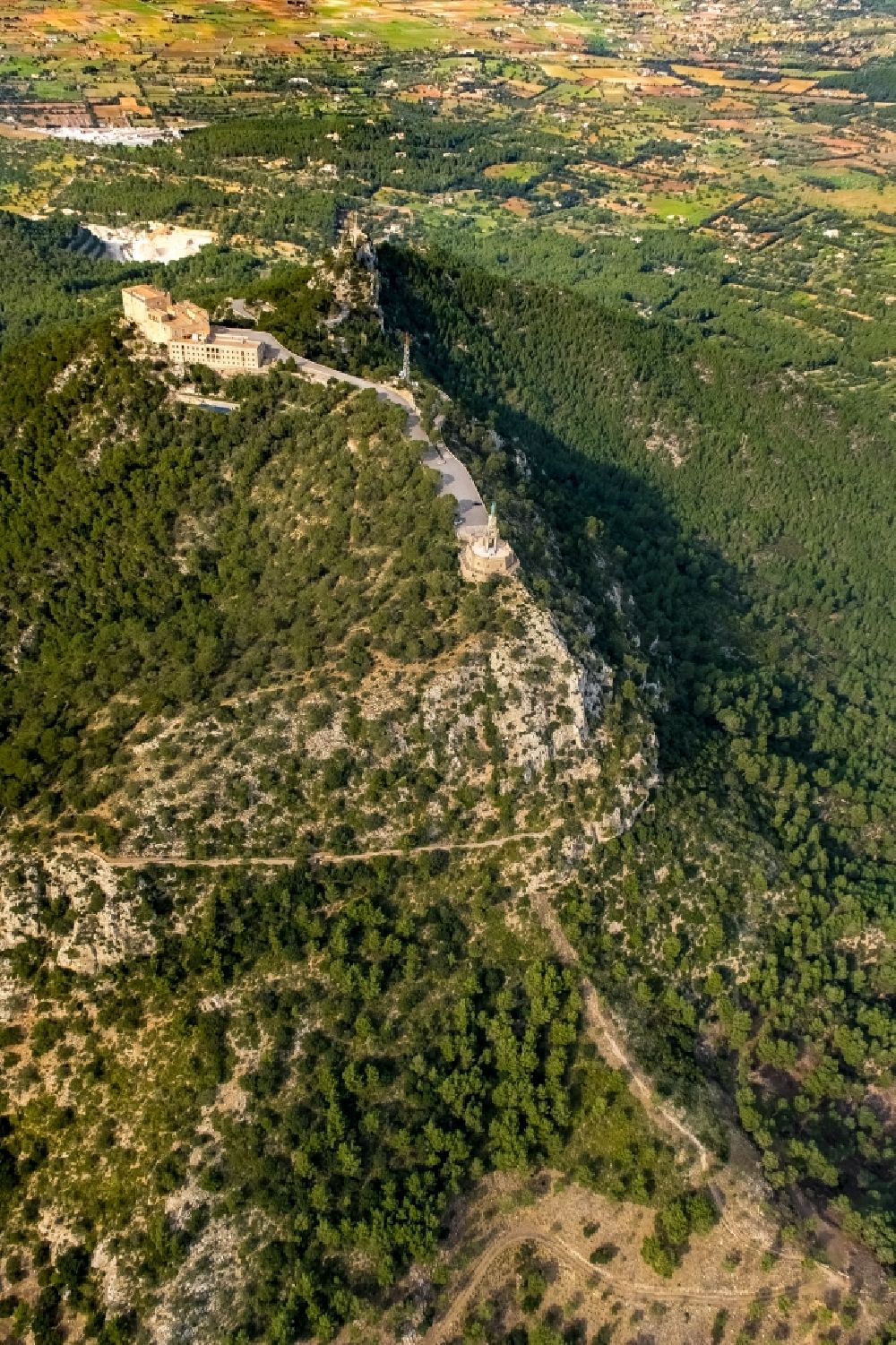Aerial image Felanich - Building as a symbol of Christian faith and religion Santuari de la Mare de Deu de Sant Salvador in Felanitx in Balearic island Mallorca, Spain