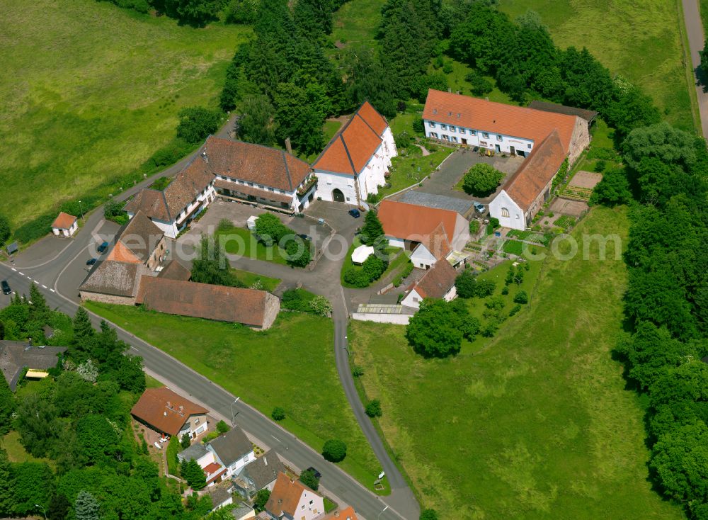 Bolanden from above - Homestead and farm outbuildings on the edge of agricultural fields in Bolanden in the state Rhineland-Palatinate, Germany