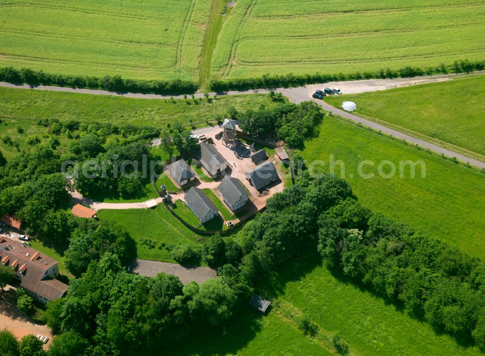 Aerial image Steinbach am Donnersberg - Homestead and farm outbuildings on the edge of agricultural fields in Steinbach am Donnersberg in the state Rhineland-Palatinate, Germany
