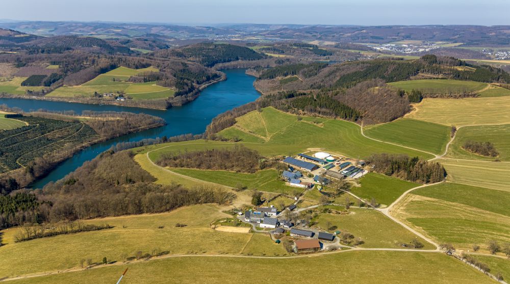 Aerial image Meschede - Farm on the edge of cultivated fields in Meschede at Sauerland in the state North Rhine-Westphalia