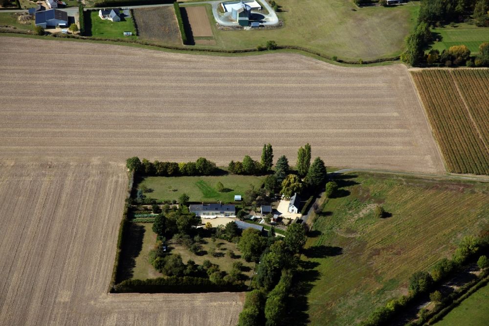 Aerial image Saint Clement des Levees - Farm on the edge of cultivated fields in Saint Clement des Levees in Pays de la Loire, France