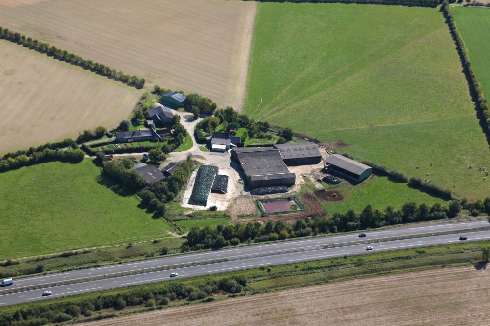 Aerial image Saint Leger des Bois - Farm on the edge of cultivated fields in Saint Leger des Bois in Pays de la Loire, France