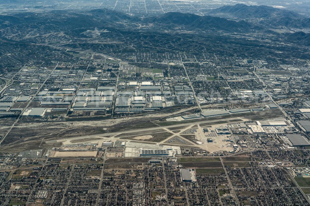 San Bernardino from the bird's eye view: Runway with hangar taxiways and terminals on the grounds of the airport San Bernardino International Airport in San Bernardino in California, United States of America