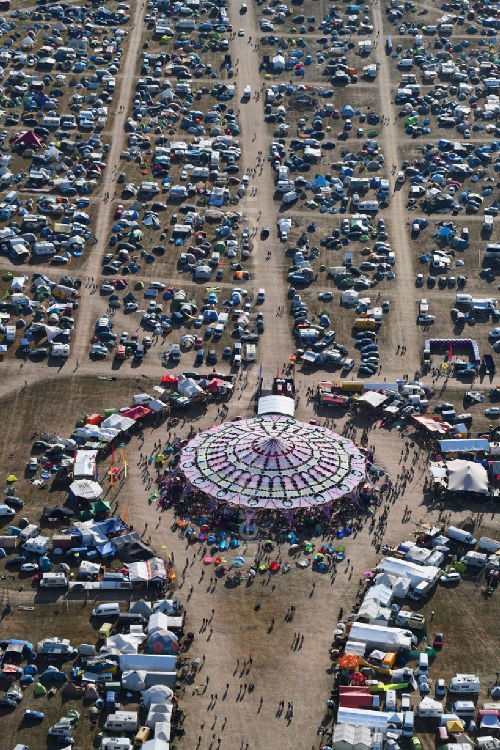 Aerial photograph Stölln - Participants in the Antaris Projekt music festival on the event concert area on airfield in Stoelln in the state Brandenburg, Germany
