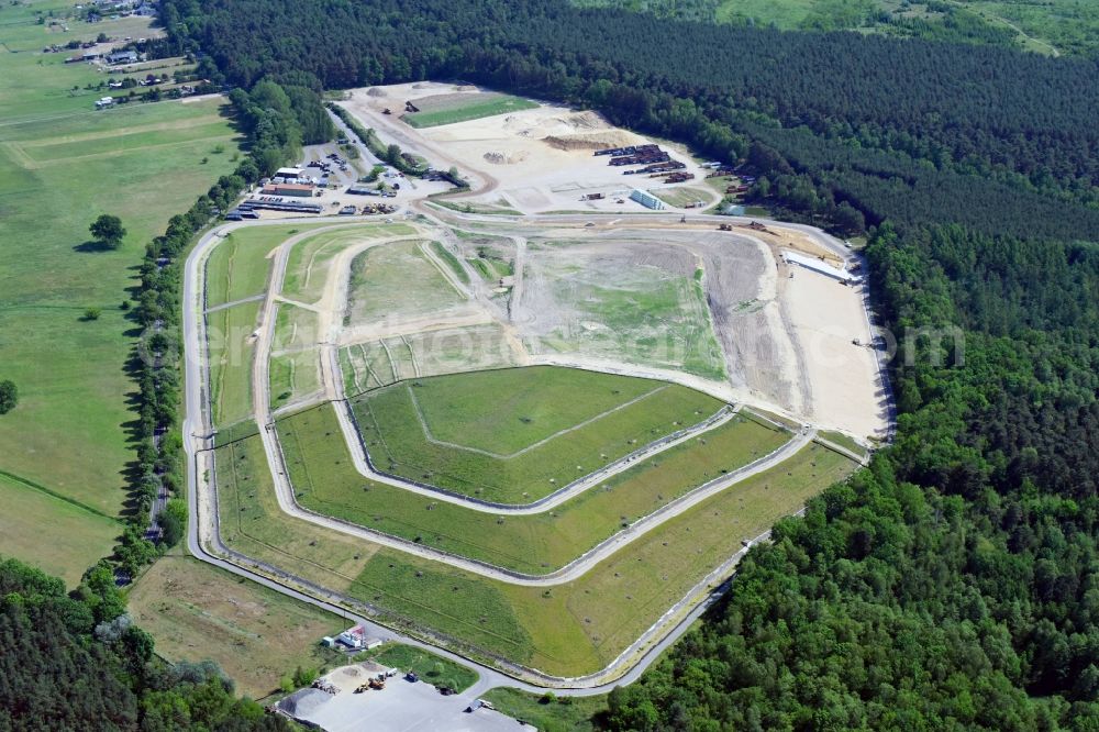 Germendorf from the bird's eye view: Site of heaped landfill on Hohenbrucher Strasse in Germendorf in the state Brandenburg, Germany