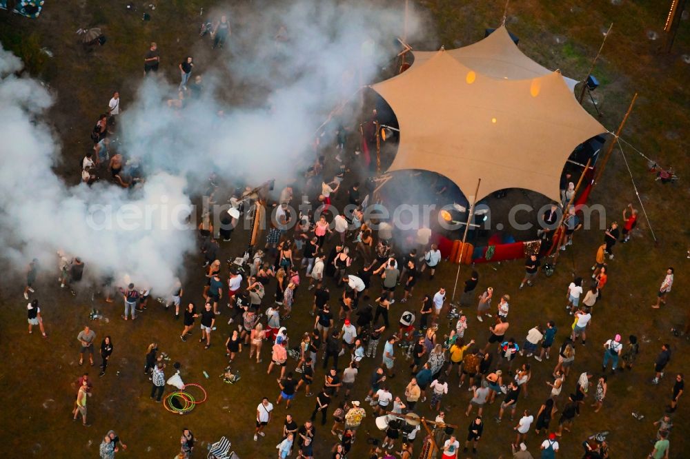 Werneuchen from above - Participants in the Aware - music festival on the event concert area in Werneuchen in the state Brandenburg, Germany