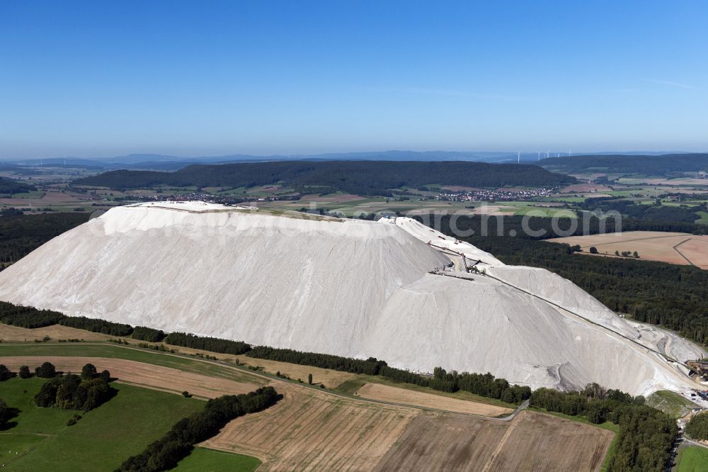 Hohenroda from above - Site of the mining stockpile for potash and salt production in Hohenroda in the state Hesse, Germany