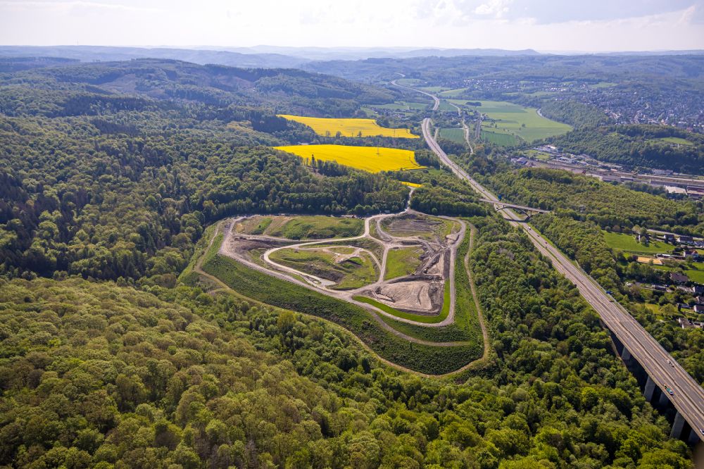 Aerial photograph Arnsberg - Site of the soil and construction waste dump on Grimmestrasse in Arnsberg in the Sauerland in the state of North Rhine-Westphalia, Germany