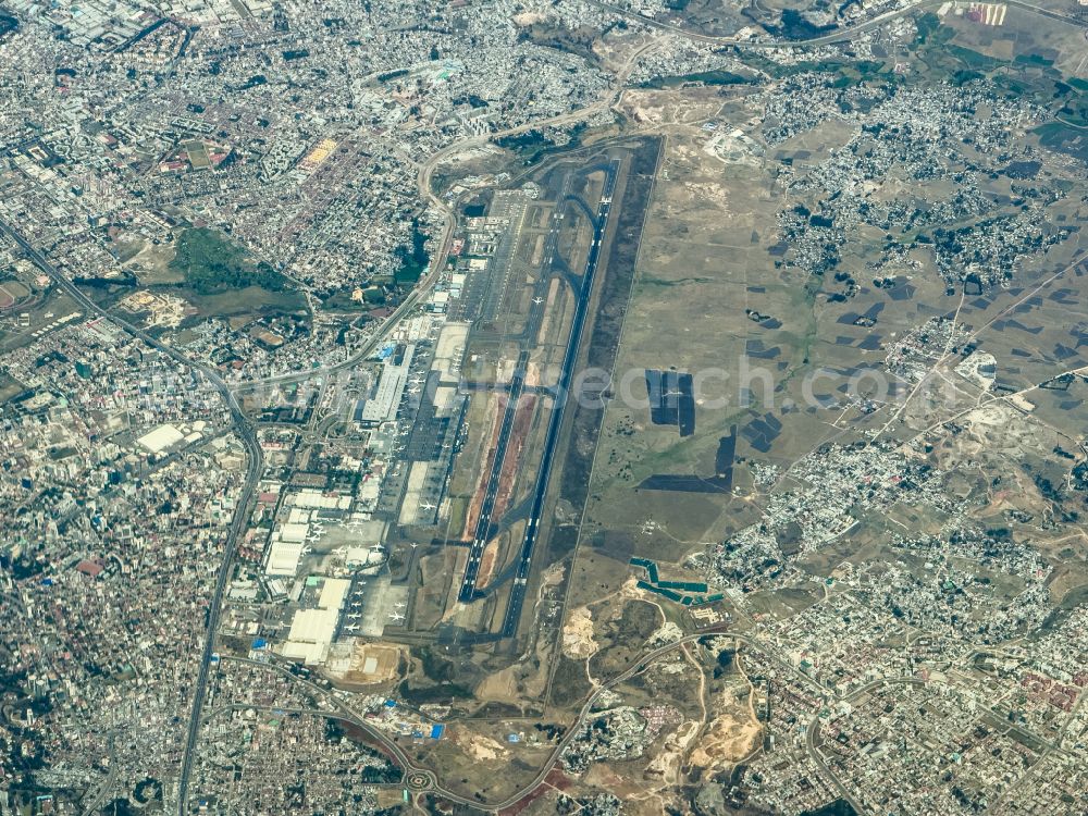 Aerial image Addis Abeba - Runway with hangar taxiways and terminals on the grounds of the airport Addis Ababa Bole International Airport on street Airport Rd in Addis Abeba in Ethiopia