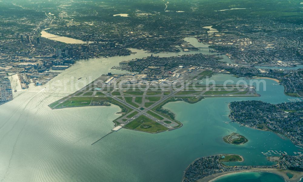Boston from the bird's eye view: Runway with hangar taxiways and terminals on the grounds of the airport Boston Logan International Airport in Boston in Massachusetts, United States of America