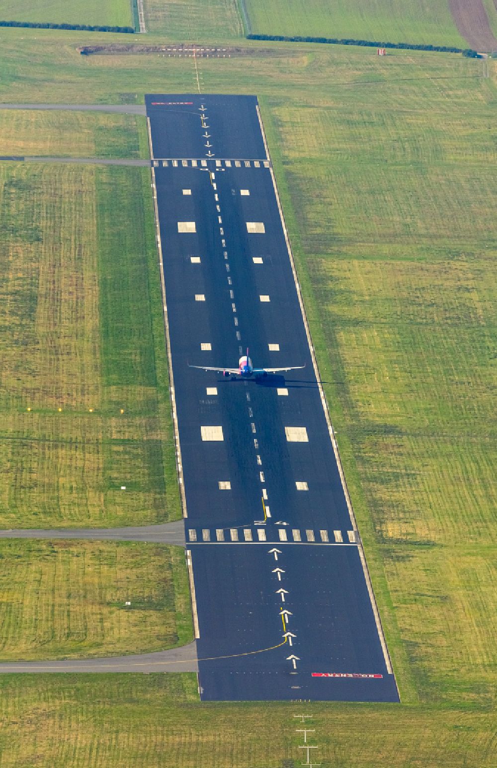 Aerial image Dortmund - Runway with hangar taxiways and terminals on the grounds of the airport in Dortmund in the state North Rhine-Westphalia, Germany