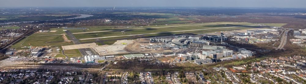 Düsseldorf from above - Runway with hangar taxiways and terminals on the grounds of the airport in Duesseldorf in the state North Rhine-Westphalia, Germany